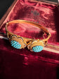 VICTORIAN HIGH CARAT GOLD & TURQUOISE BOMBE BANGLE