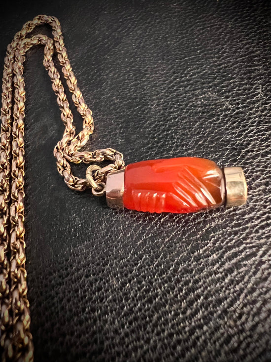 GEORGIAN CARNELIAN CLASPED HAND PENDANT