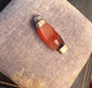 GEORGIAN CARNELIAN CLASPED HAND PENDANT