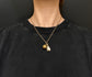 MOTHER OF PEARL HAND PENDANT